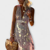 Robe fluide avec décolleté en V et détails en sequins
